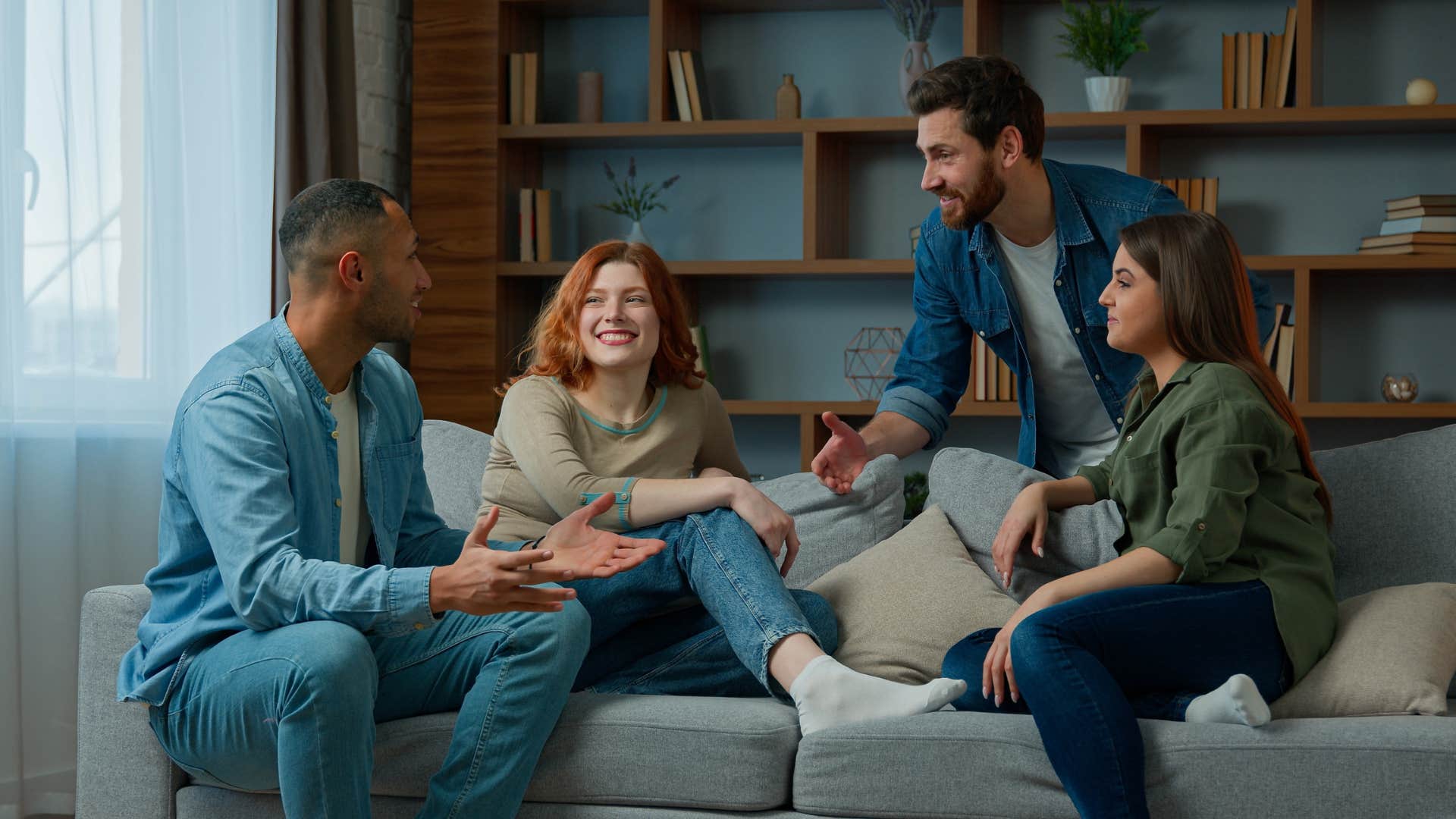group of friends sitting on couch
