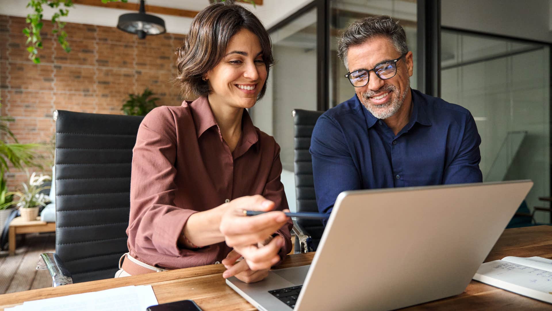 woman who doesn't care about competing with others talking to a peer