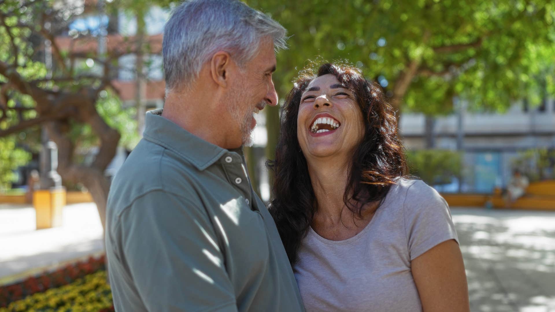 couple who doesn't care about control smiling together