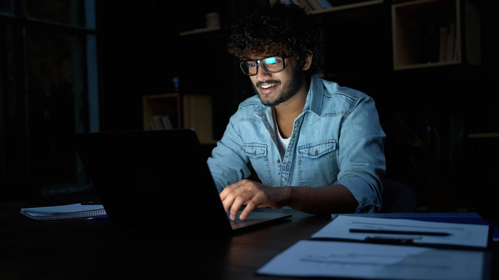 man in jacket researching conspiracy theories