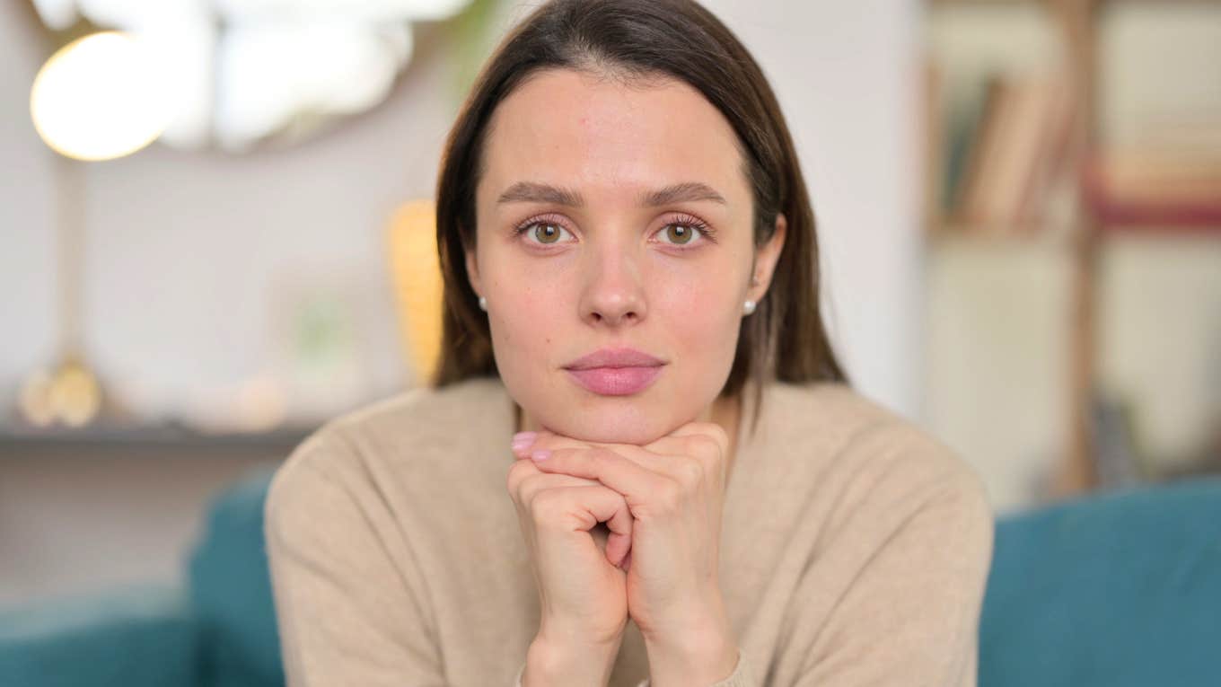 intelligent woman quietly thinking and observing