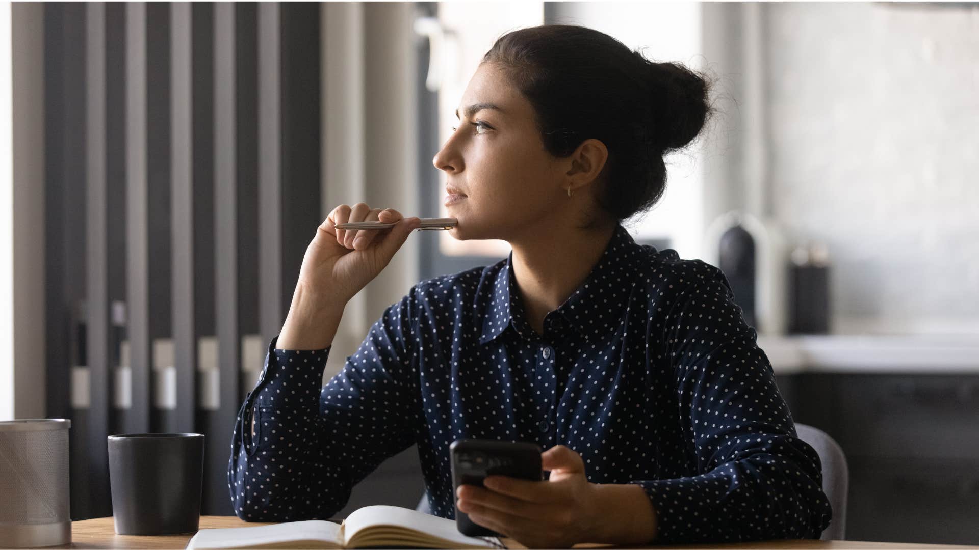 woman weighing her options to make a decision