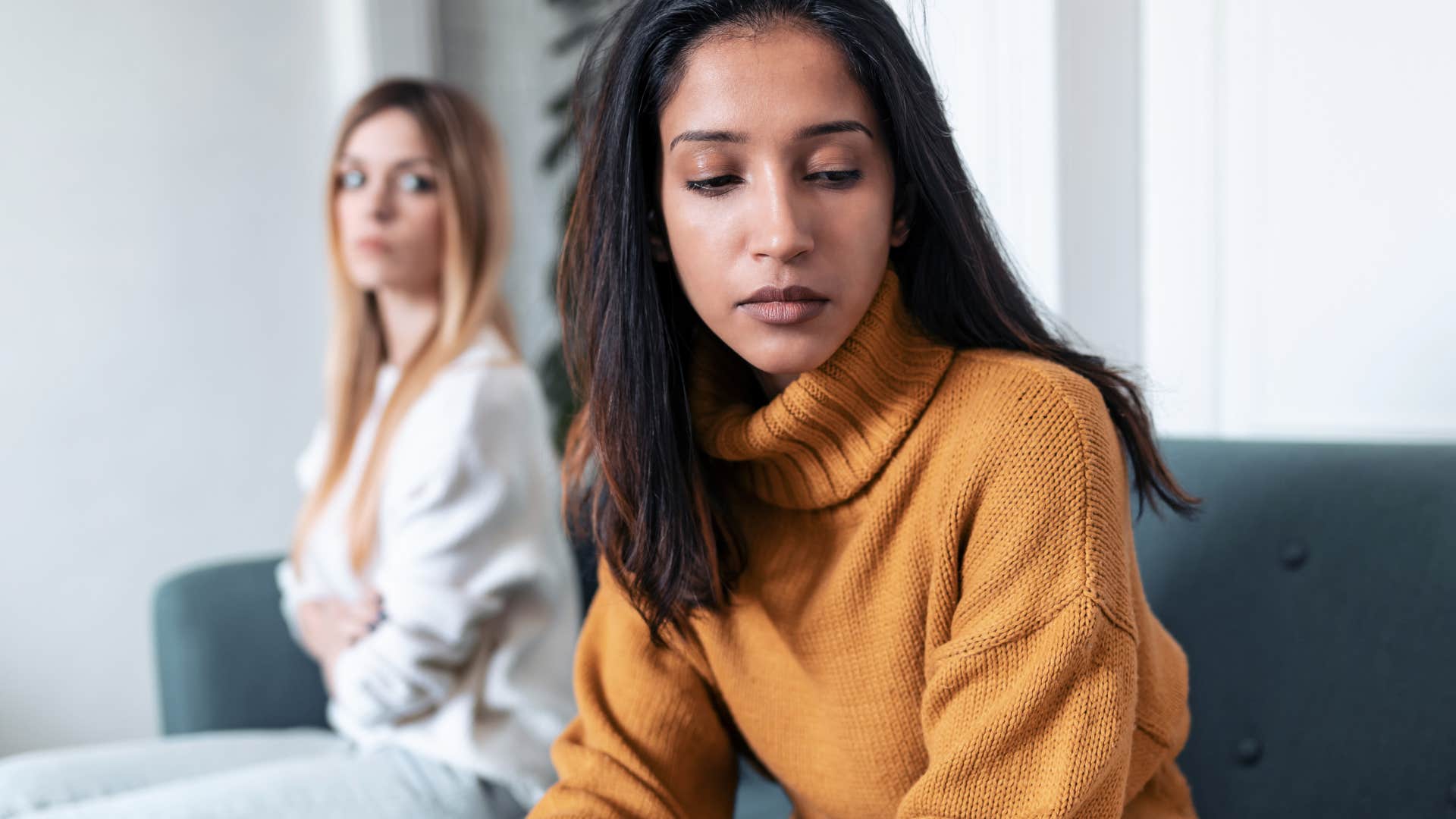 extroverted woman annoyed with friend who wont keep eye contact