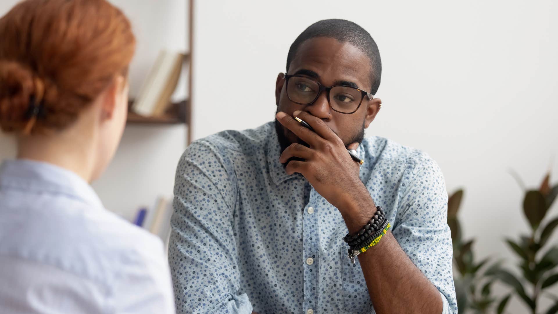 extroverted man annoyed by lack of leadership at work