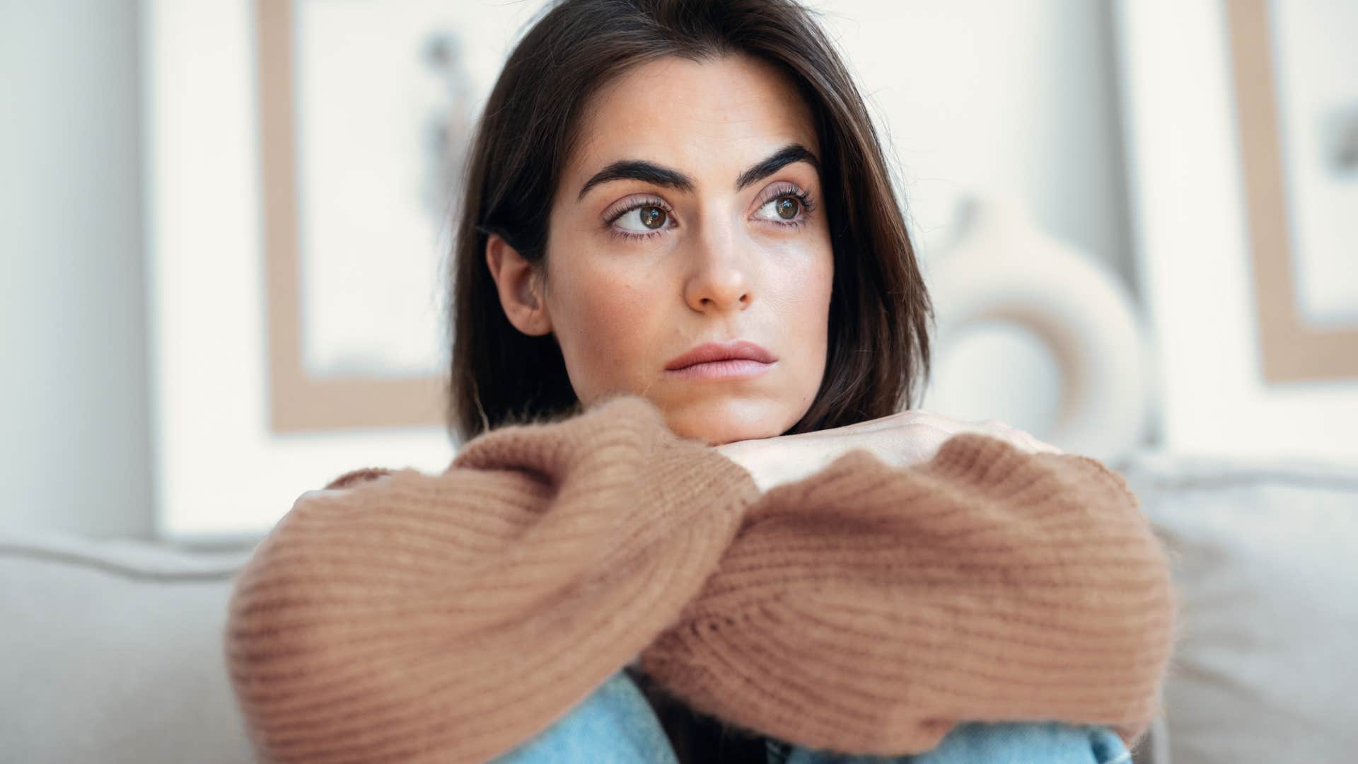 extroverted woman upset shes staying home instead of going out