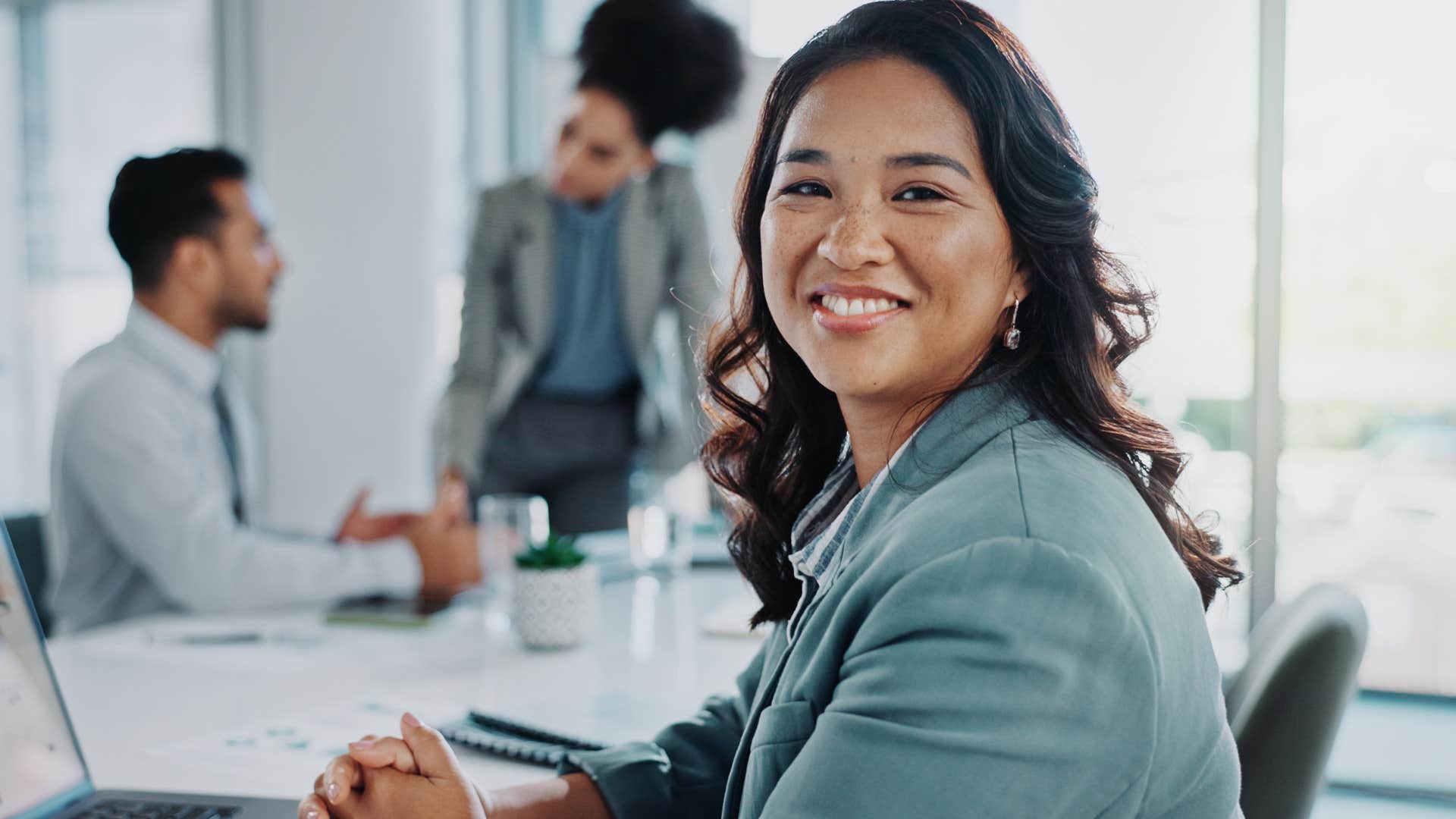 introverted woman with a strong sense of purpose at work