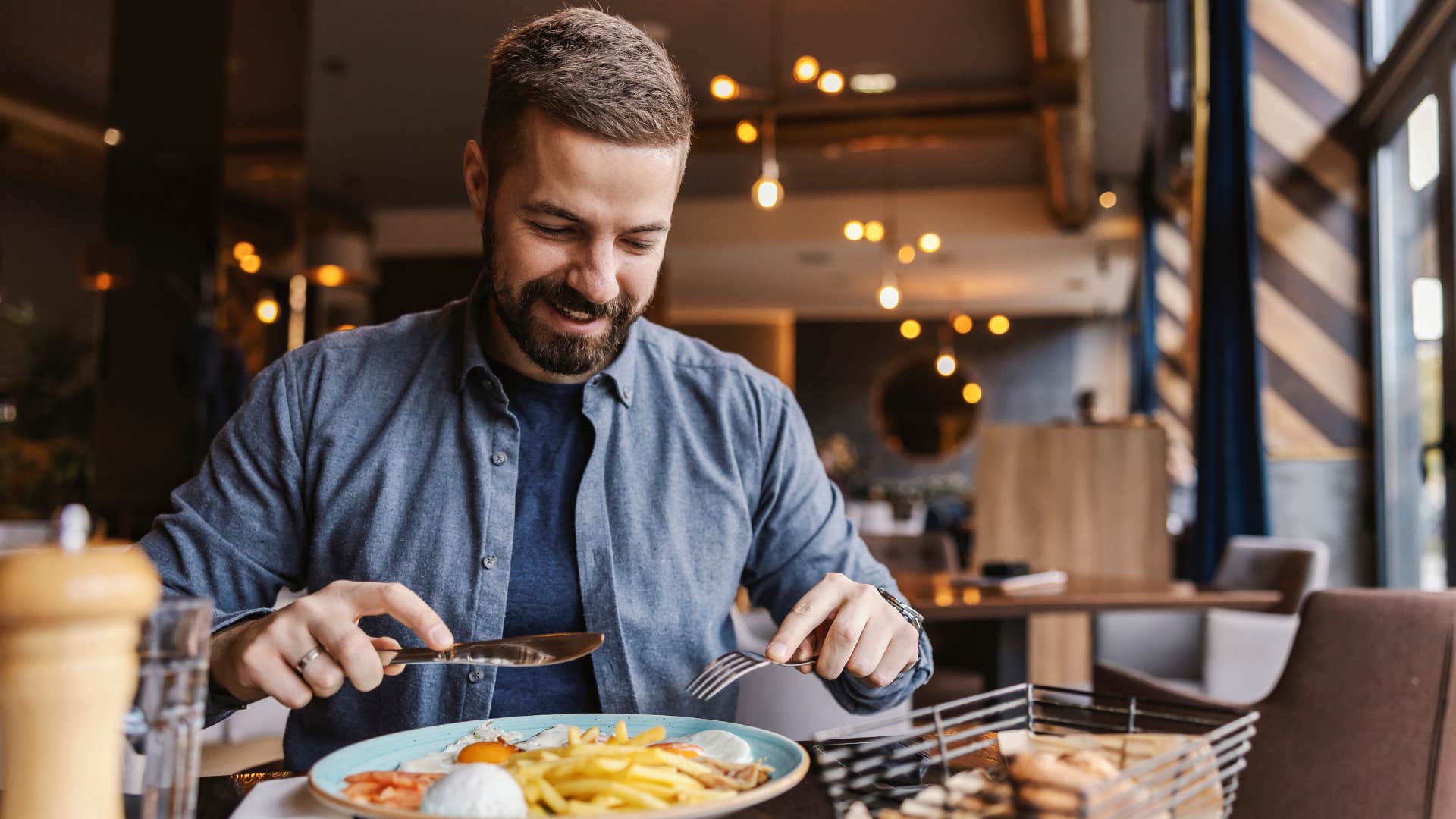man eating at a really good restaurant