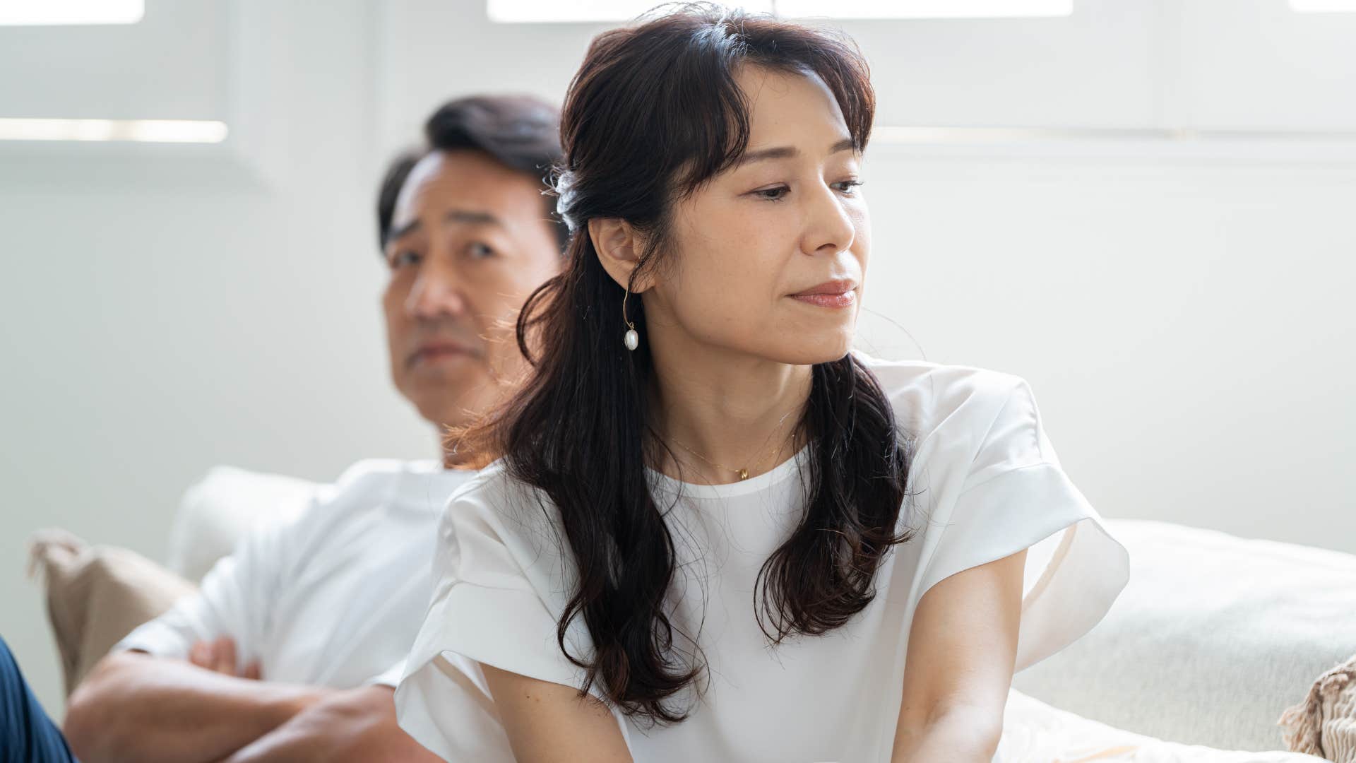 woman saying I don't know why I even try so hard to sad husband