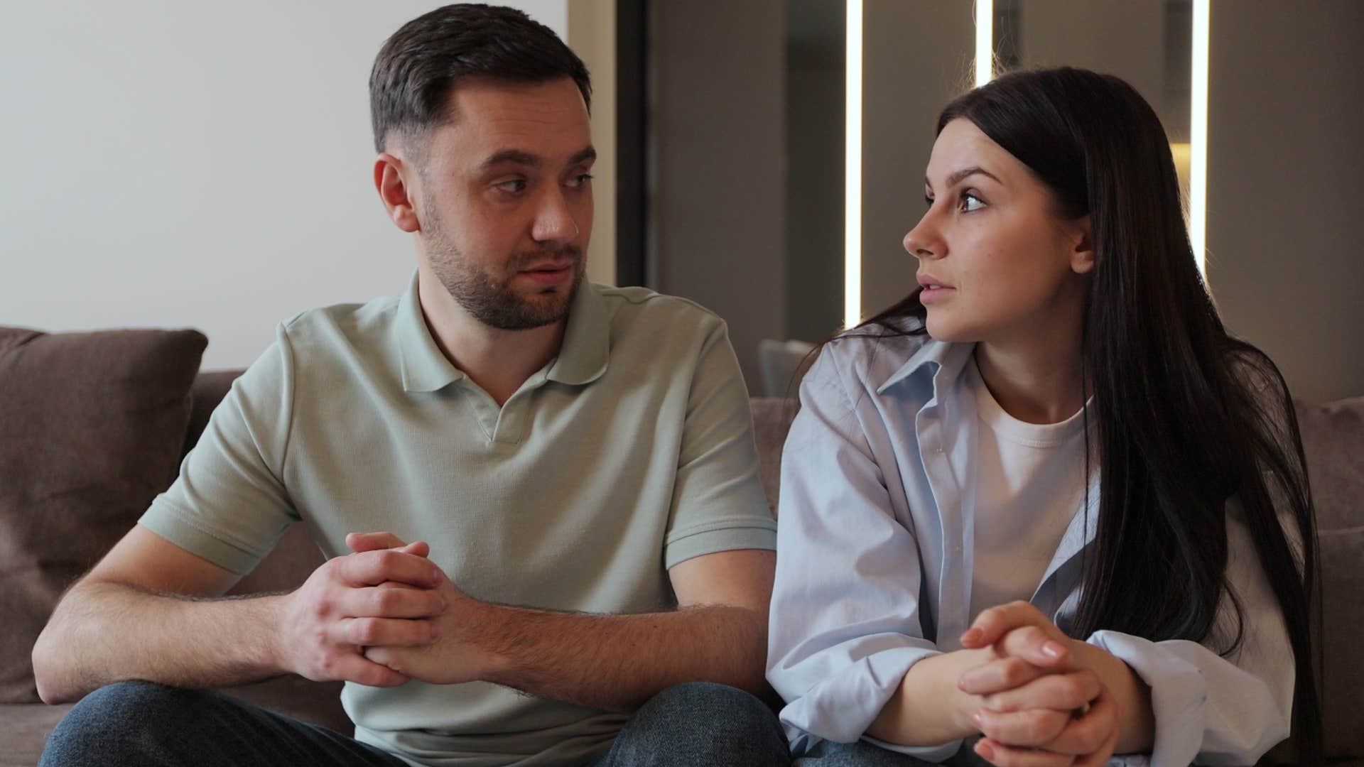 introverted woman correcting her partner