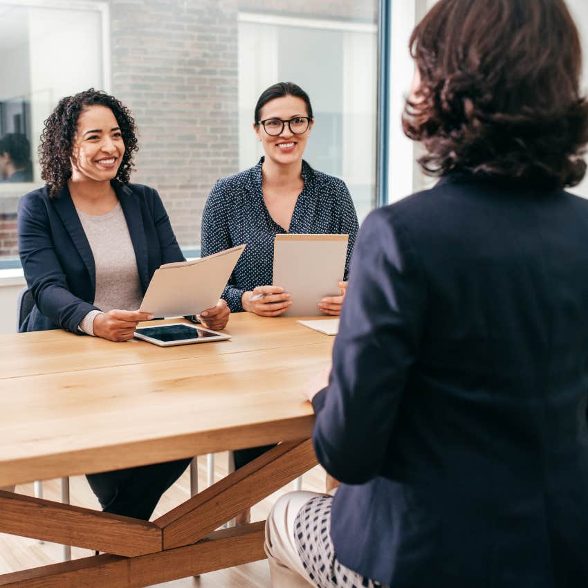 job seeker being interviewed by executives