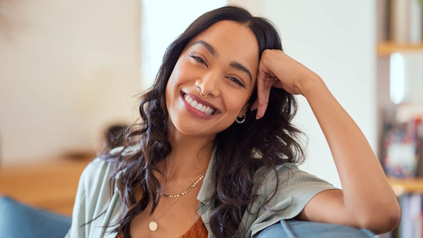 introverted woman with high intelligence smiling