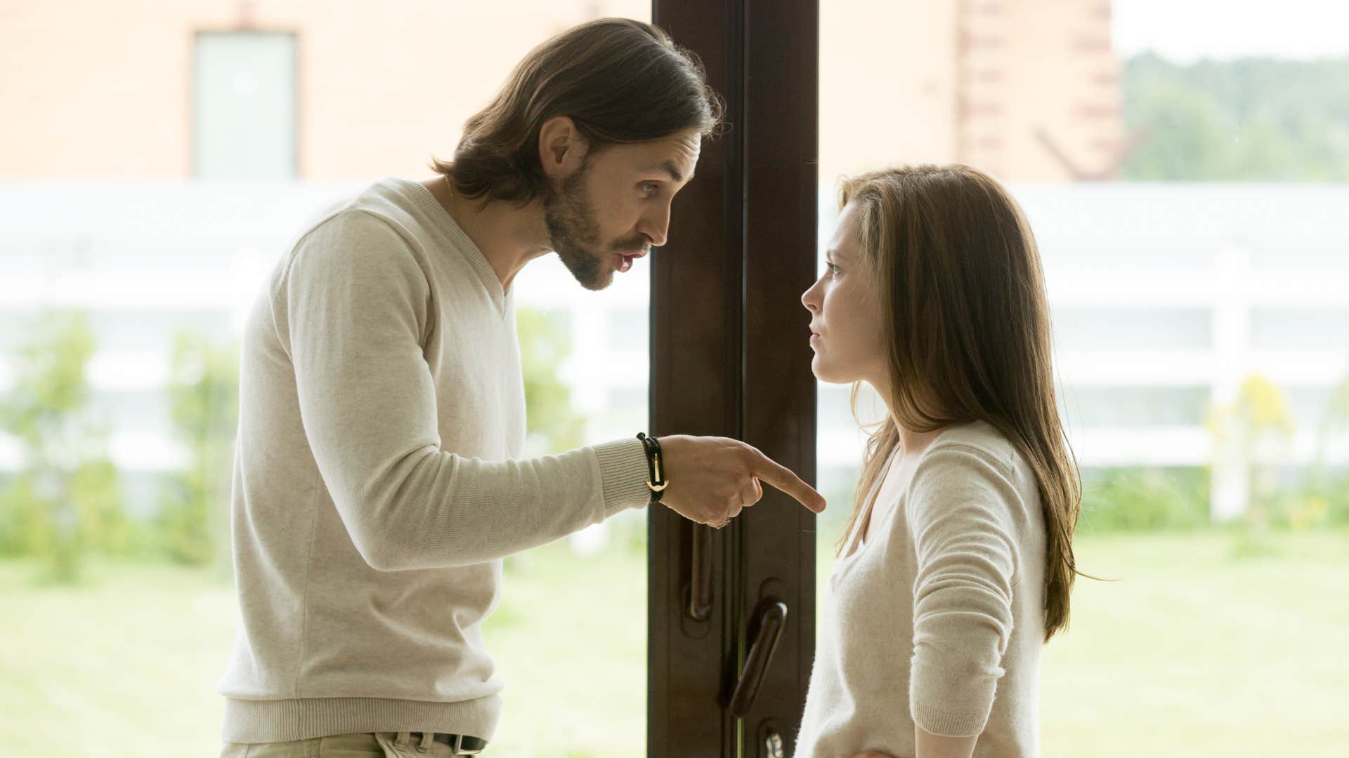 low-value man being critical towards partner yelling at her