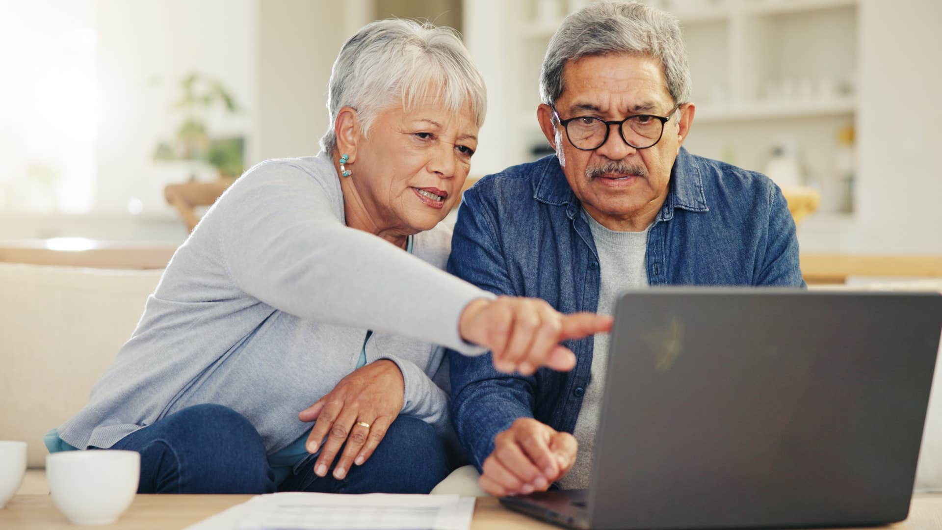 boomer couple forwarding emails about spam and coupons to their kids