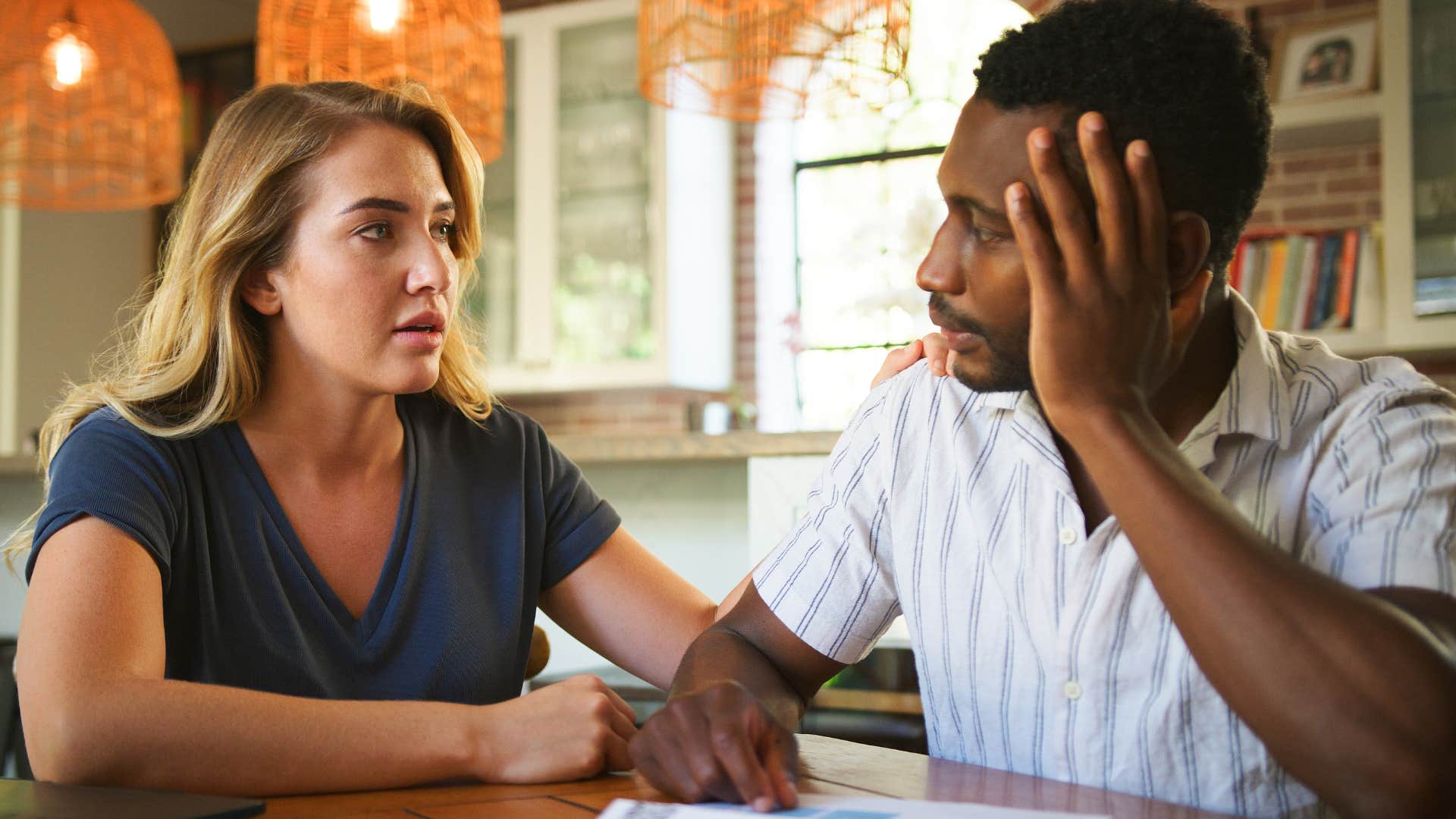 empathetic man talking with caring friend