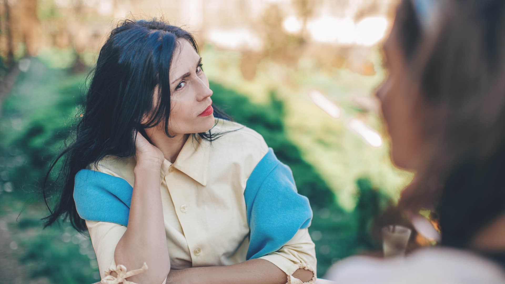 woman being mindful about topics during conversation