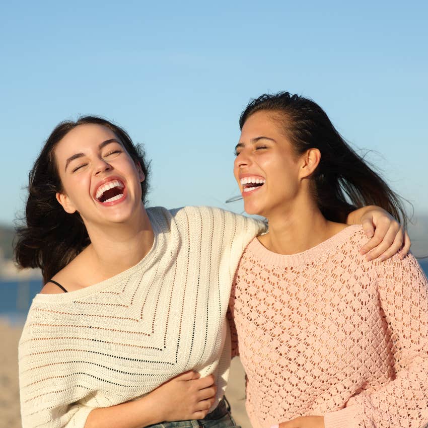 woman with a sense of humor as it helps her connect with people