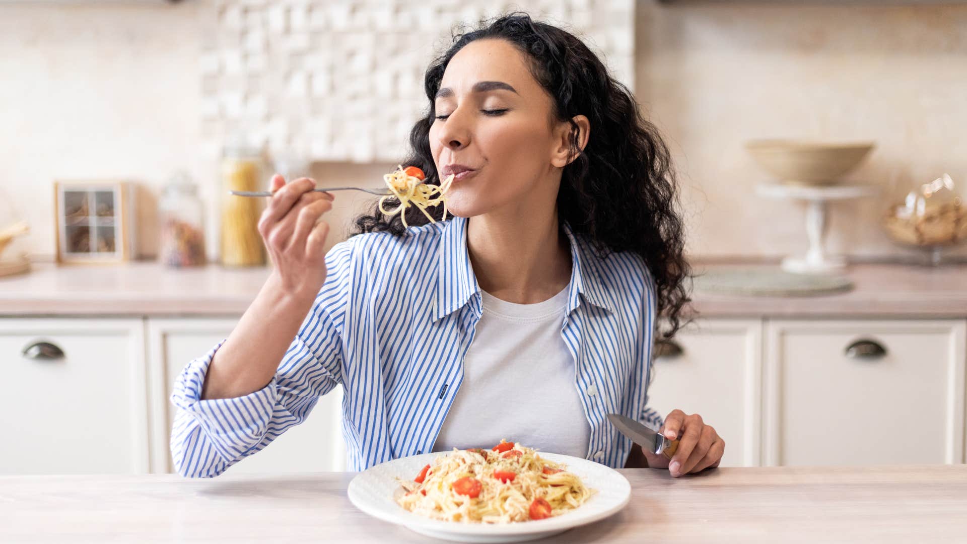 woman eating separately from husband