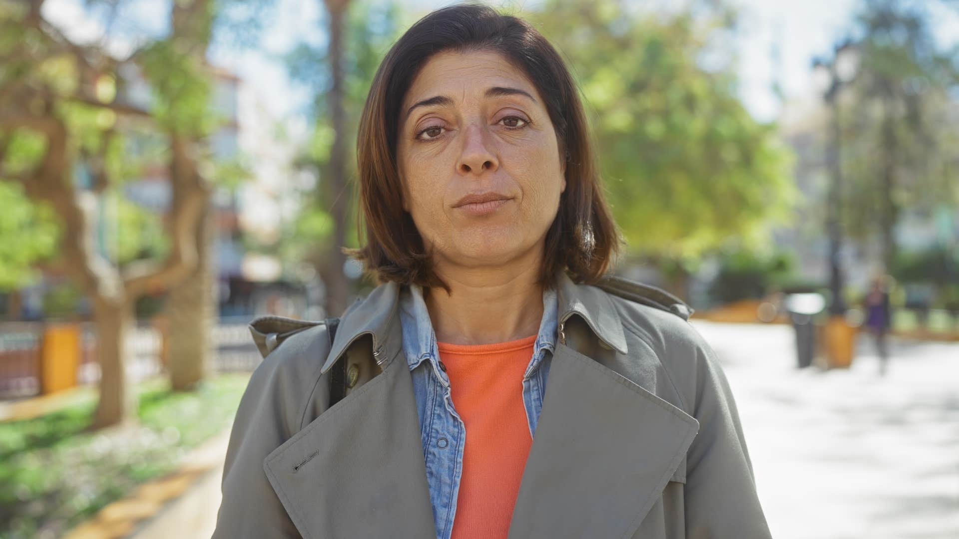 woman who's less tolerant of stress looking serious