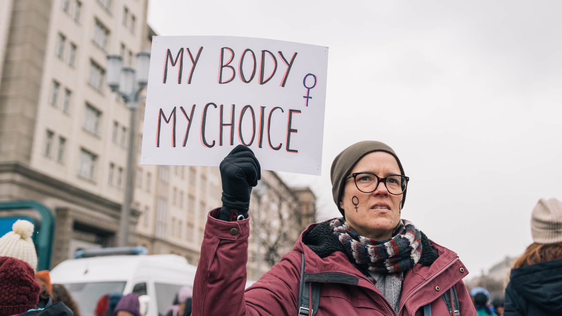 privileged woman protesting without considering intersectional feminist issues
