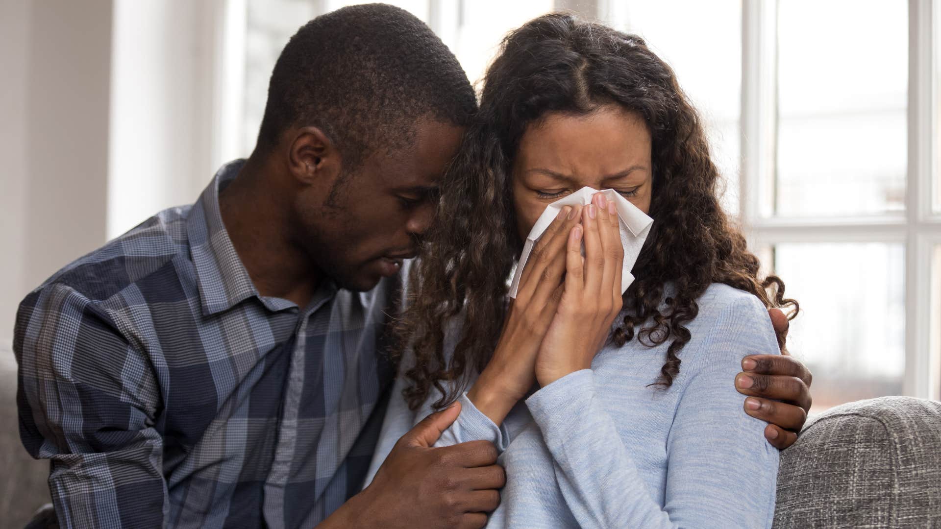woman weaponizing tears for attention from man