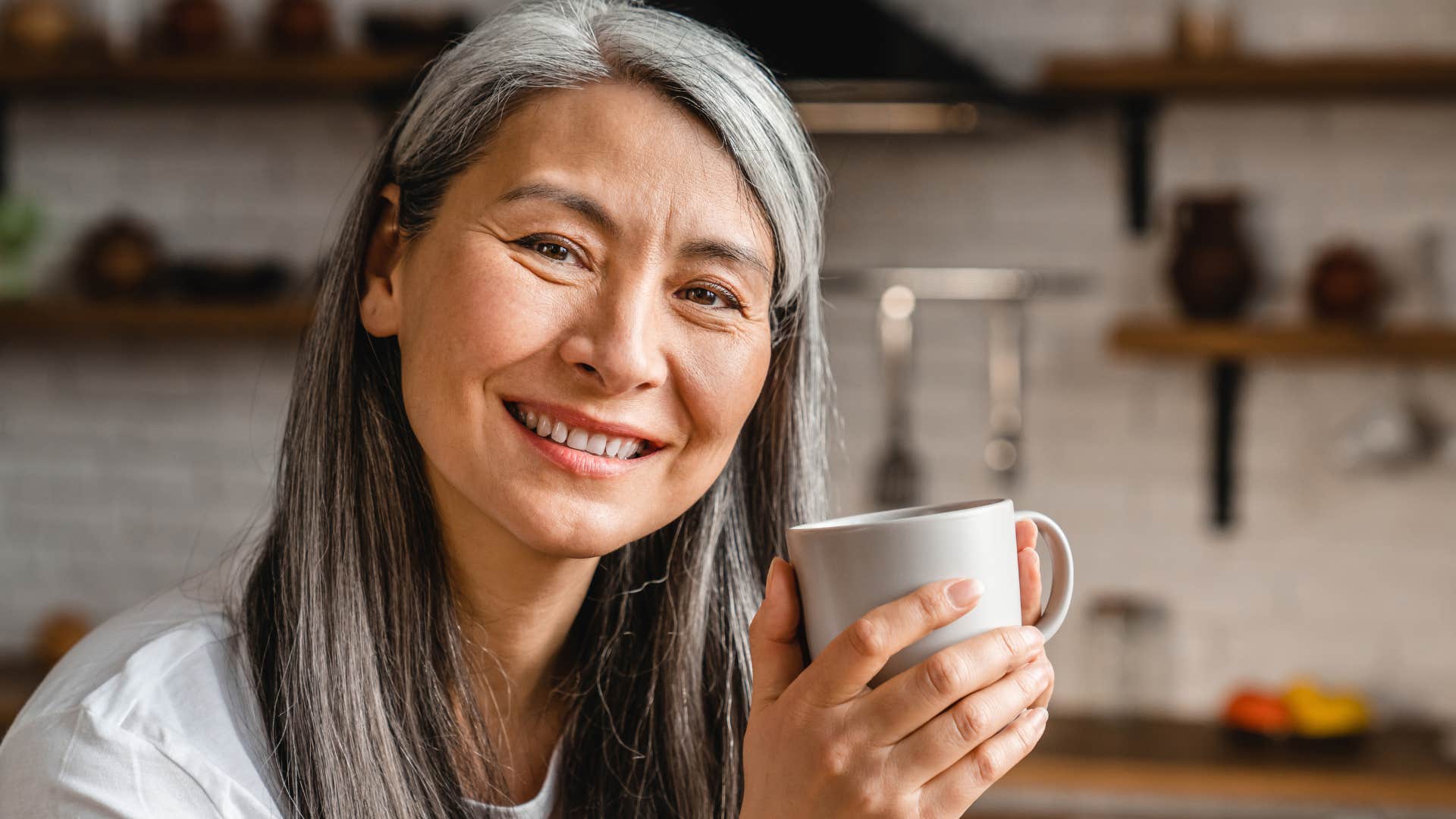 woman who needs space to reflect and regulate drinking coffee