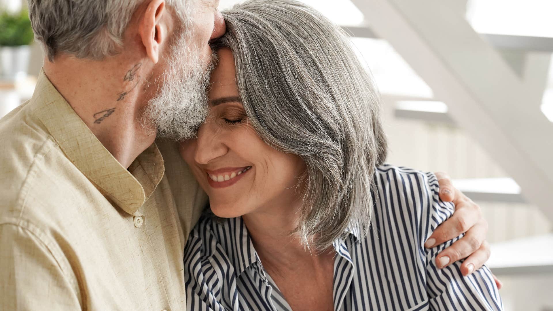 woman who has strong relationships hugging her partner