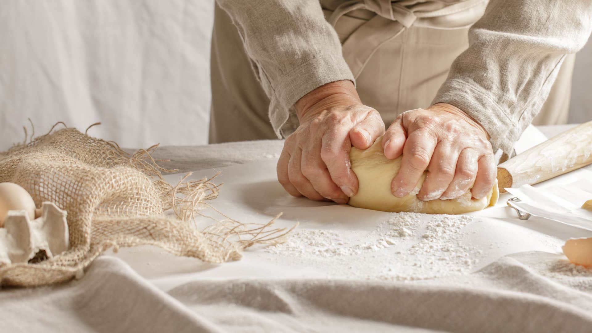 grandparent making bread from scratch