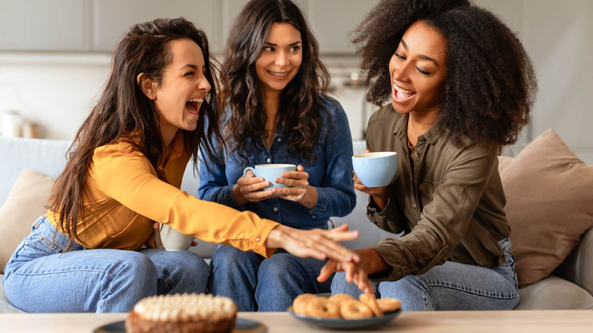 friends laughing and catching up together 