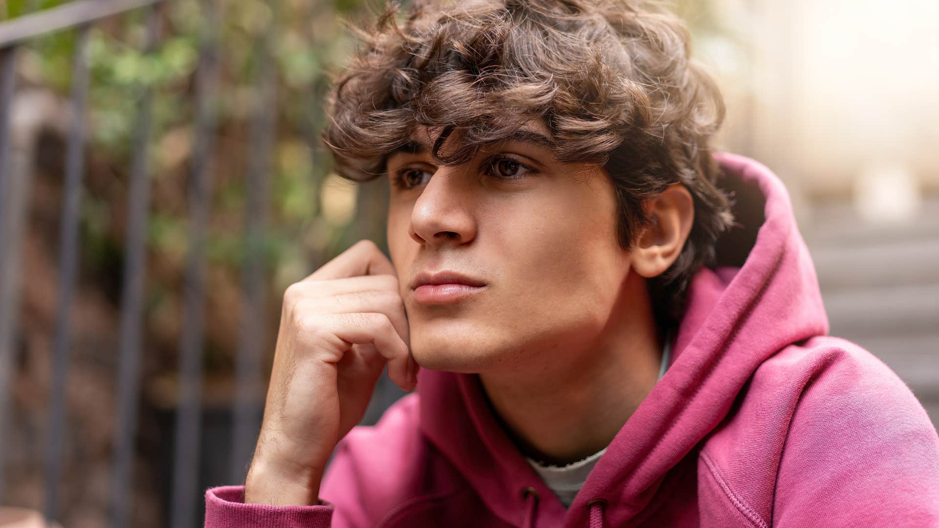 pensive young man questioning everything