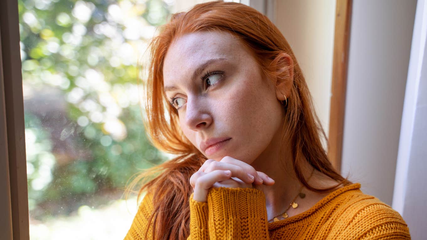 young spiritual woman distancing herself from religion