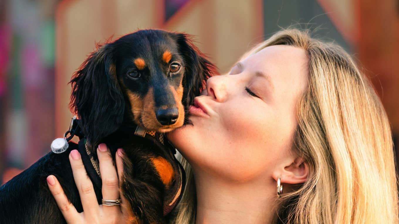 Animal teaches human about love.