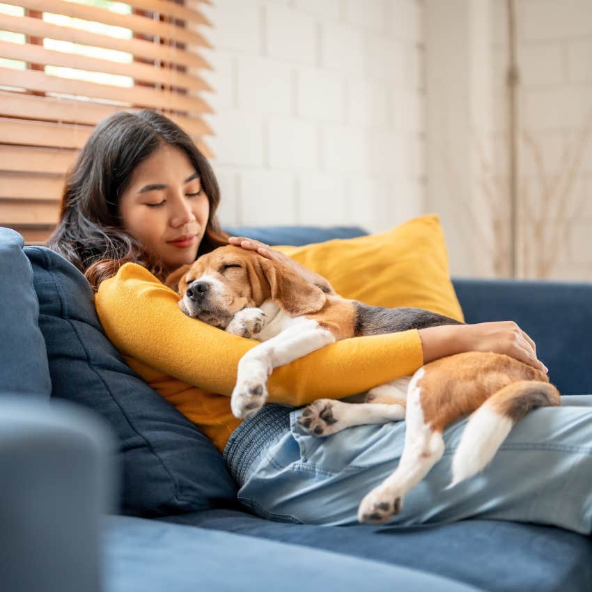 woman who is being taught love from animal