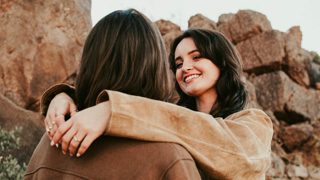 The Art Of Attraction: Invisible Factors That Pull Two People Together Smiling couple sharing a magnetic connection, representing the invisible factors that create attraction between two people.