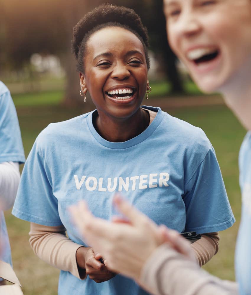 Naturally joyful volunteers smile