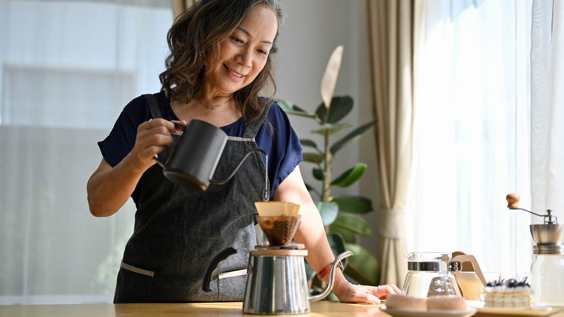 Calm person shifts focus to present by making coffee