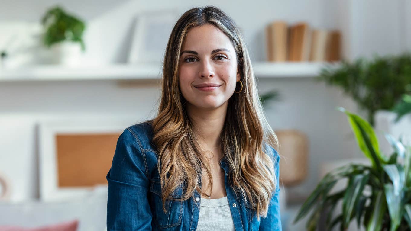 upper middle class woman smiling at home