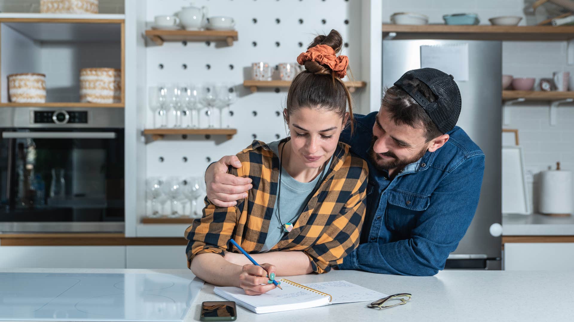 couple creating a bucket list before they get married