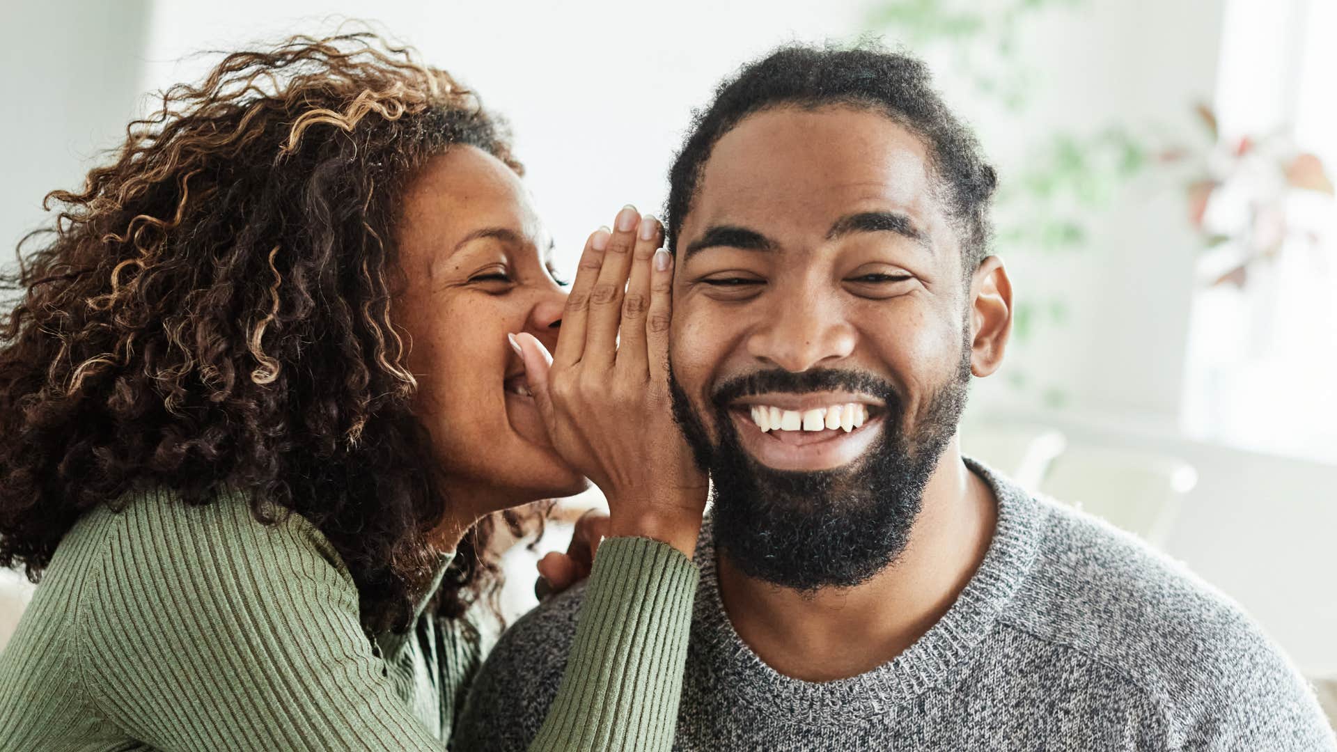 Laughing couple rebuild trust