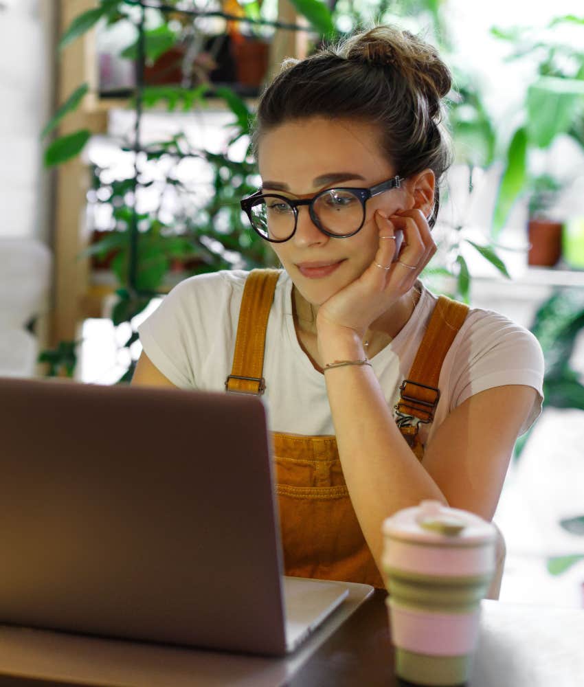 More People Are Moving Back To Their Hometowns Than Leaving Them woman working remotely in hometown