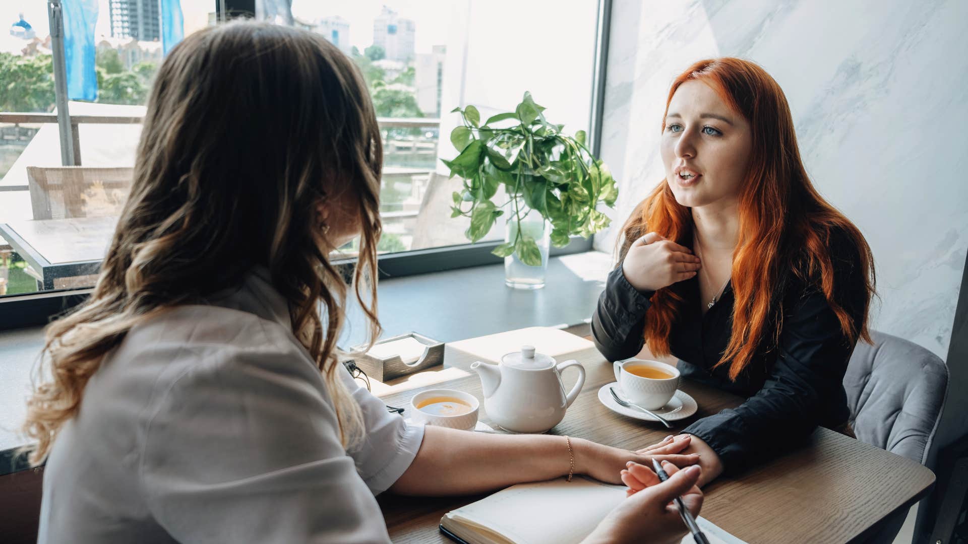 woman who is an empath with a job as a life coach that heals