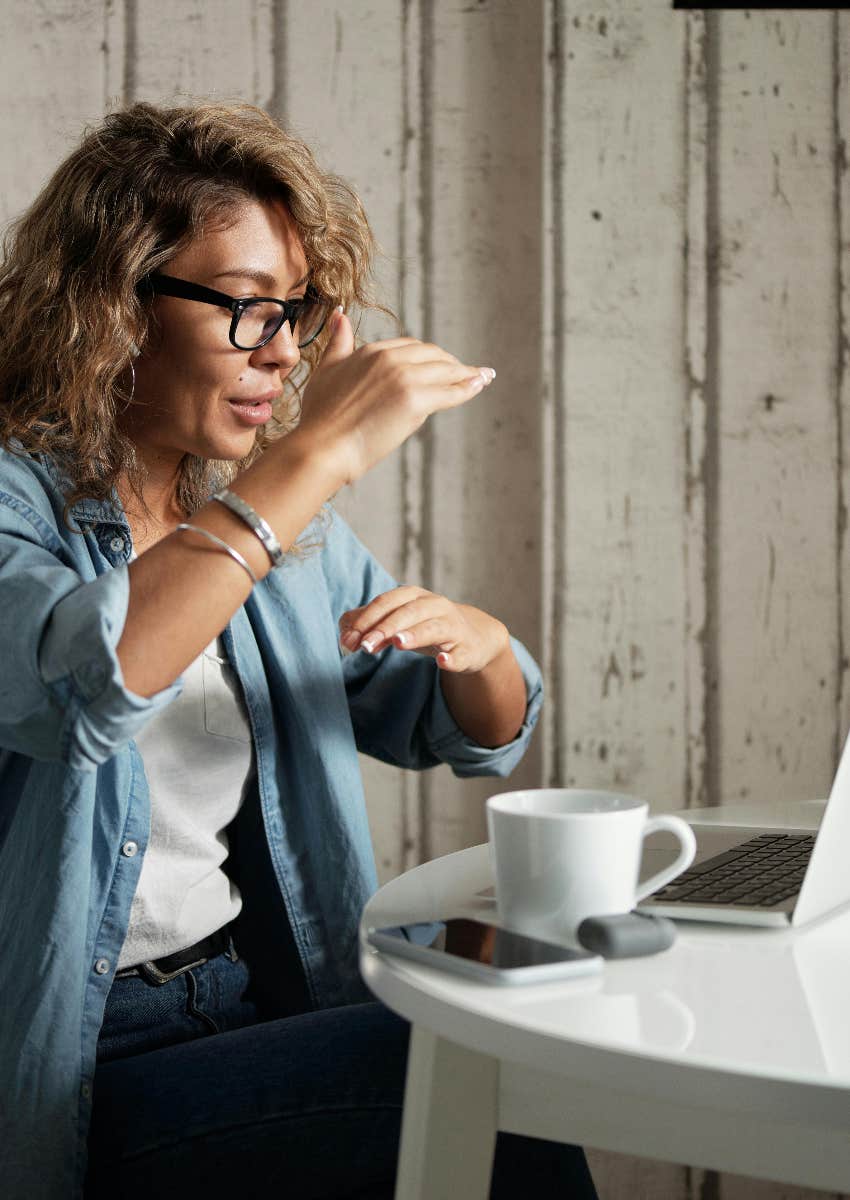 woman in virtual team building meeting