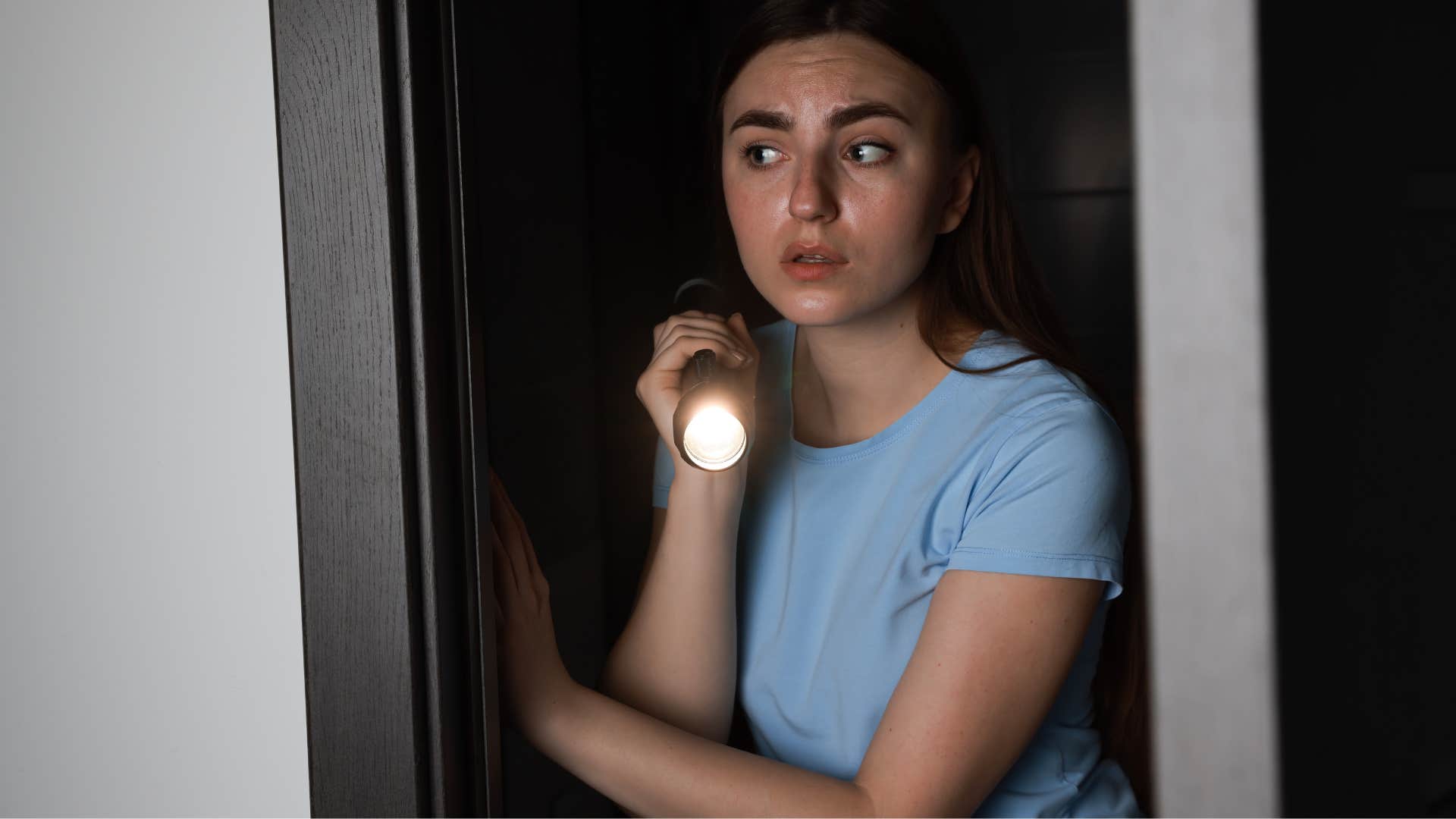 chilling signs a poltergeist might be haunting your home have electrical interference woman who might have a poltergeist haunting her home as she has electrical interference