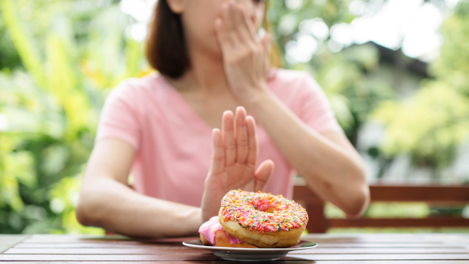 chilling signs you've been targeted by dark energy eating habits change woman who has been targeted by dark energy as her eating habits have changed