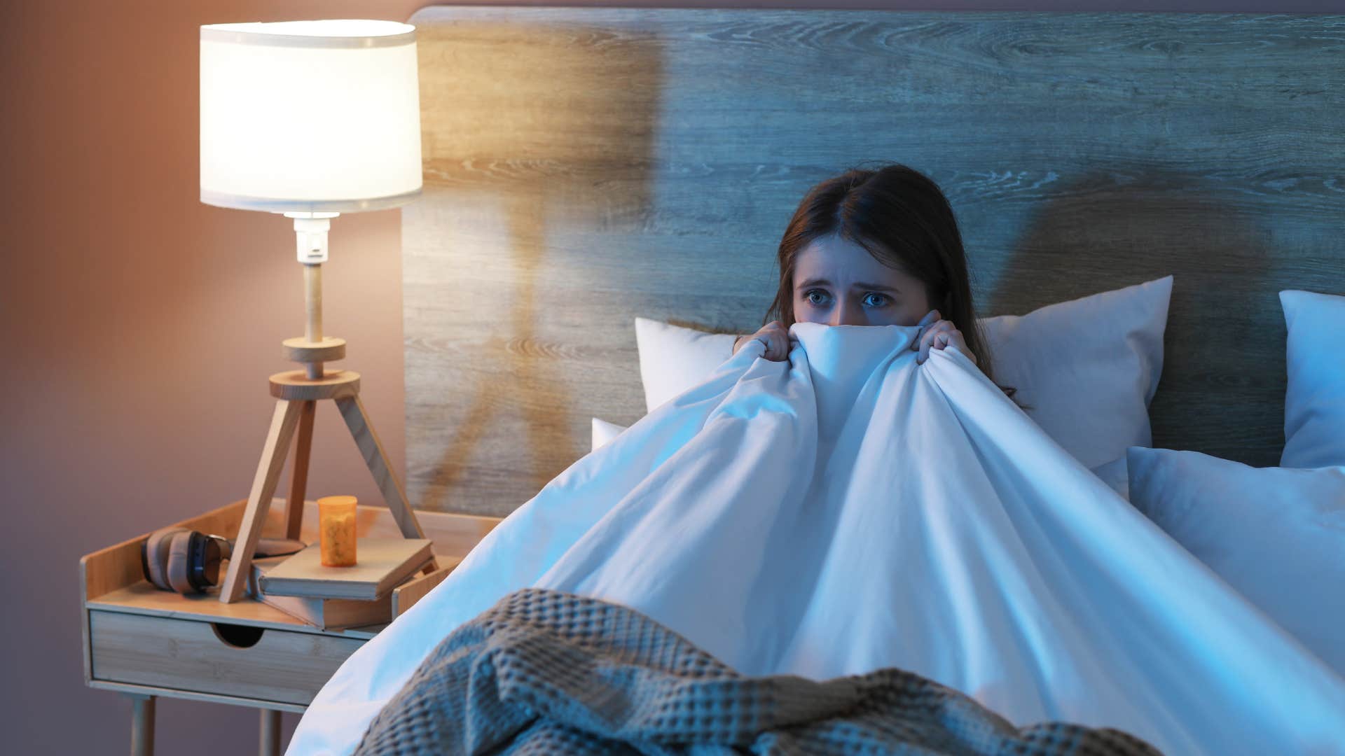 chilling signs you've been targeted by dark energy have frequent nightmares woman who has been targeted by dark energy as she has frequent nightmares