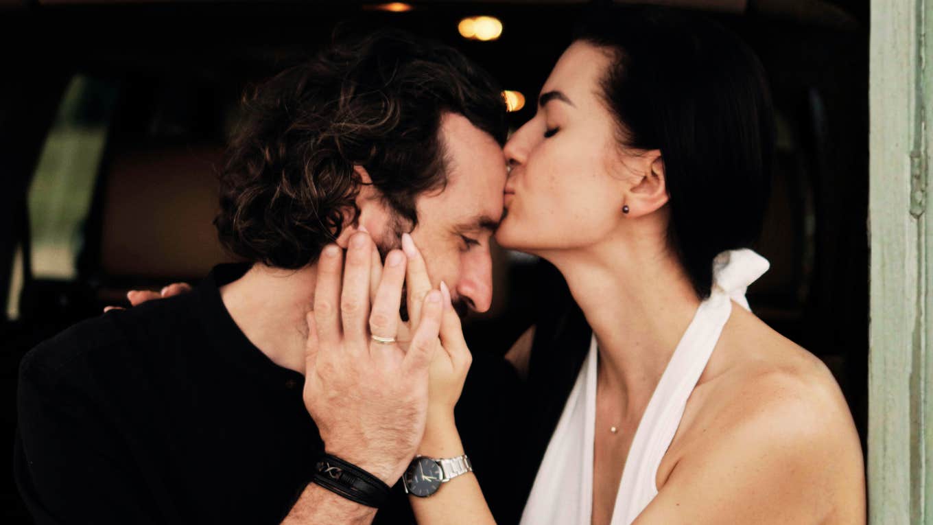 Sweet Behaviors That Make Men Feel Safe And Loved  Woman comforting man sweetly, making him feel safe and loved.