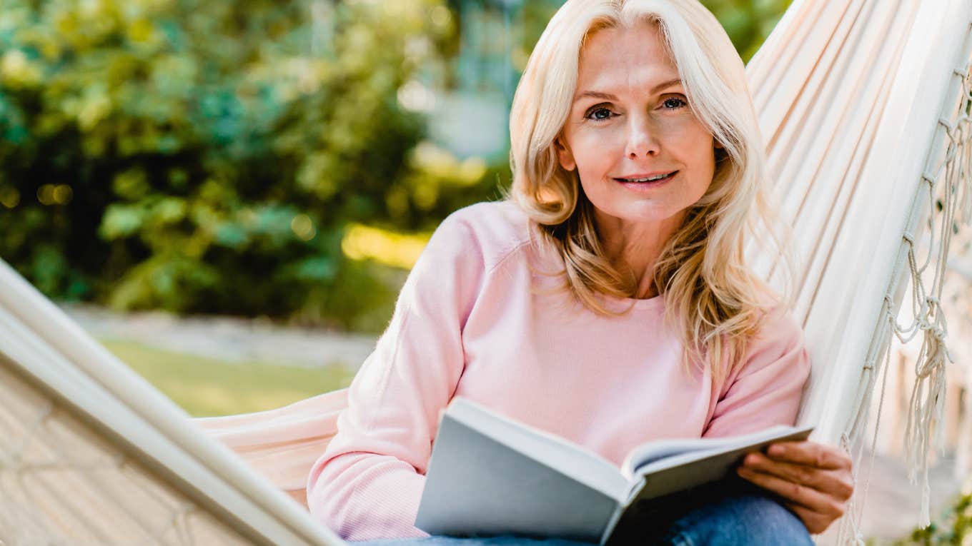 Comforting Reasons Trustworthy People Always Carry An Emotional Support Book With Them trustworthy woman reading a book in a hammock