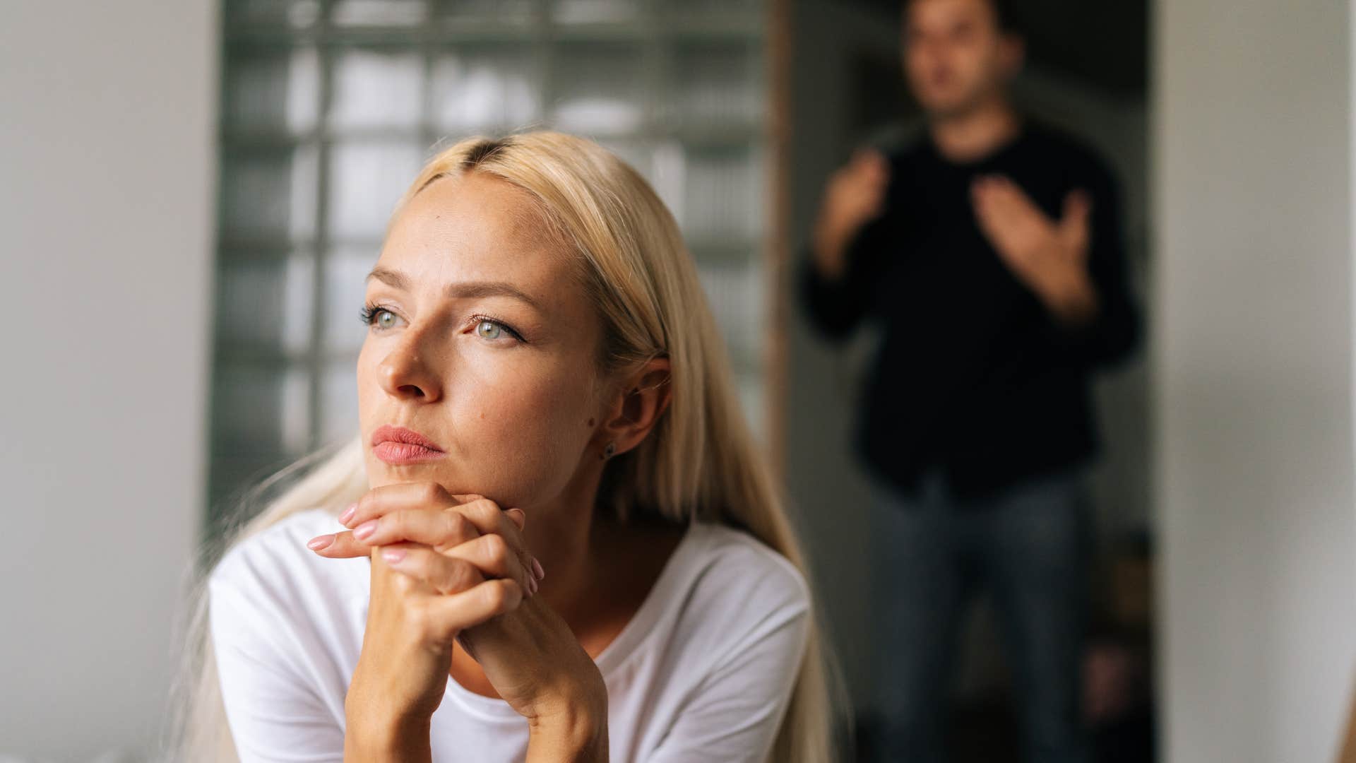 if a couple barely touches each other anymore, it usually means these things about their marriage your communication has declined woman in white shirt ignoring man as their communication has declined