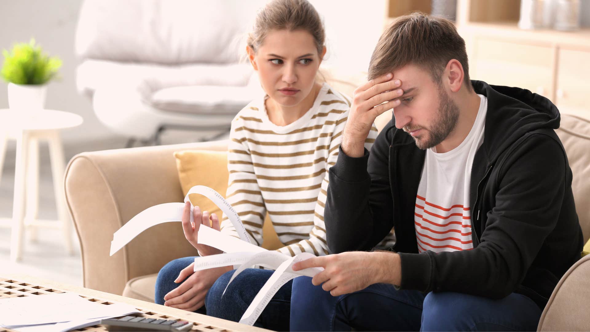 couple arguing about money and saving habits