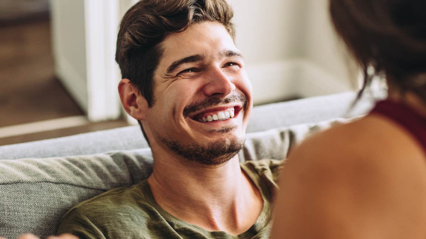 Couples Deeply Connected Prioritize Types Intimacy Man smiling in a couple where they've prioritized all types of intimacy