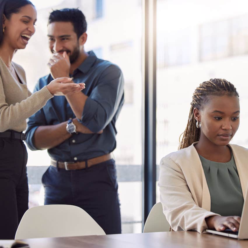 woman who is trying to get coworker fired by sharing her personal business with others